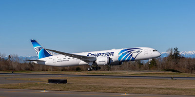 EGYPTAIR's Boeing 787-9 Dreamliners aircraft flying over a runway.