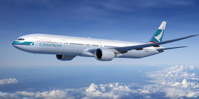 Cathay Pacific Airways' Boeing 777 flying oer the clouds.