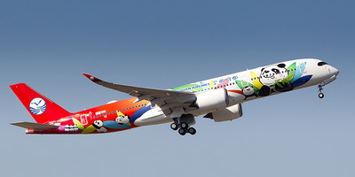 Sichuan Airlines' Airbus A350-900 aircraft flying through the air.