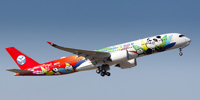 Sichuan Airlines' Airbus A350-900 aircraft flying through the air.