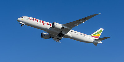 Ethiopian Airlines' Boeing 787-9 Dreamliner aircraft flying through the sky.